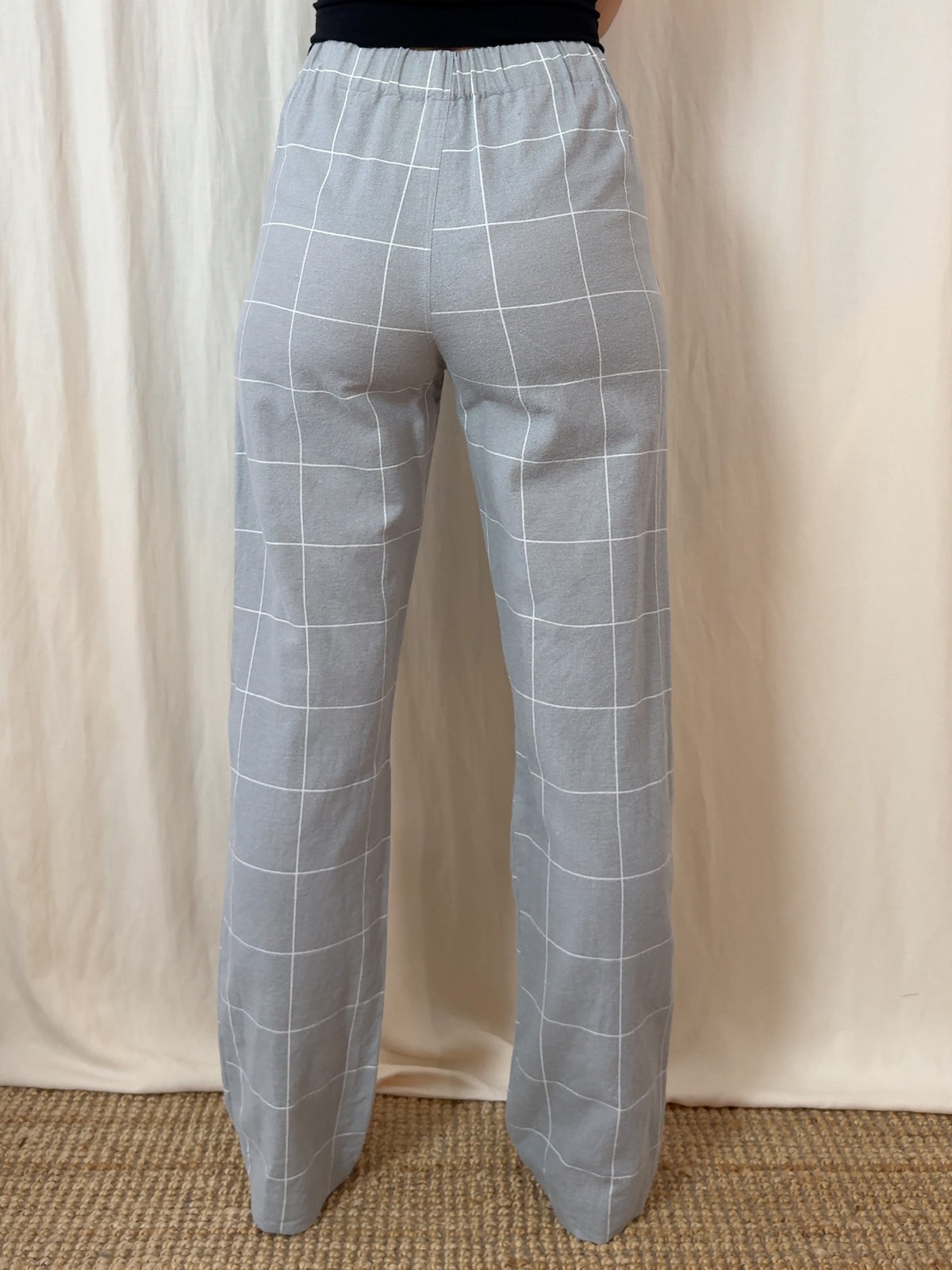 Straight trousers in light grey checks flannel