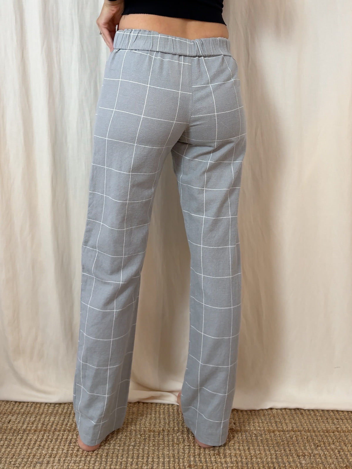 Straight trousers in light grey checks flannel