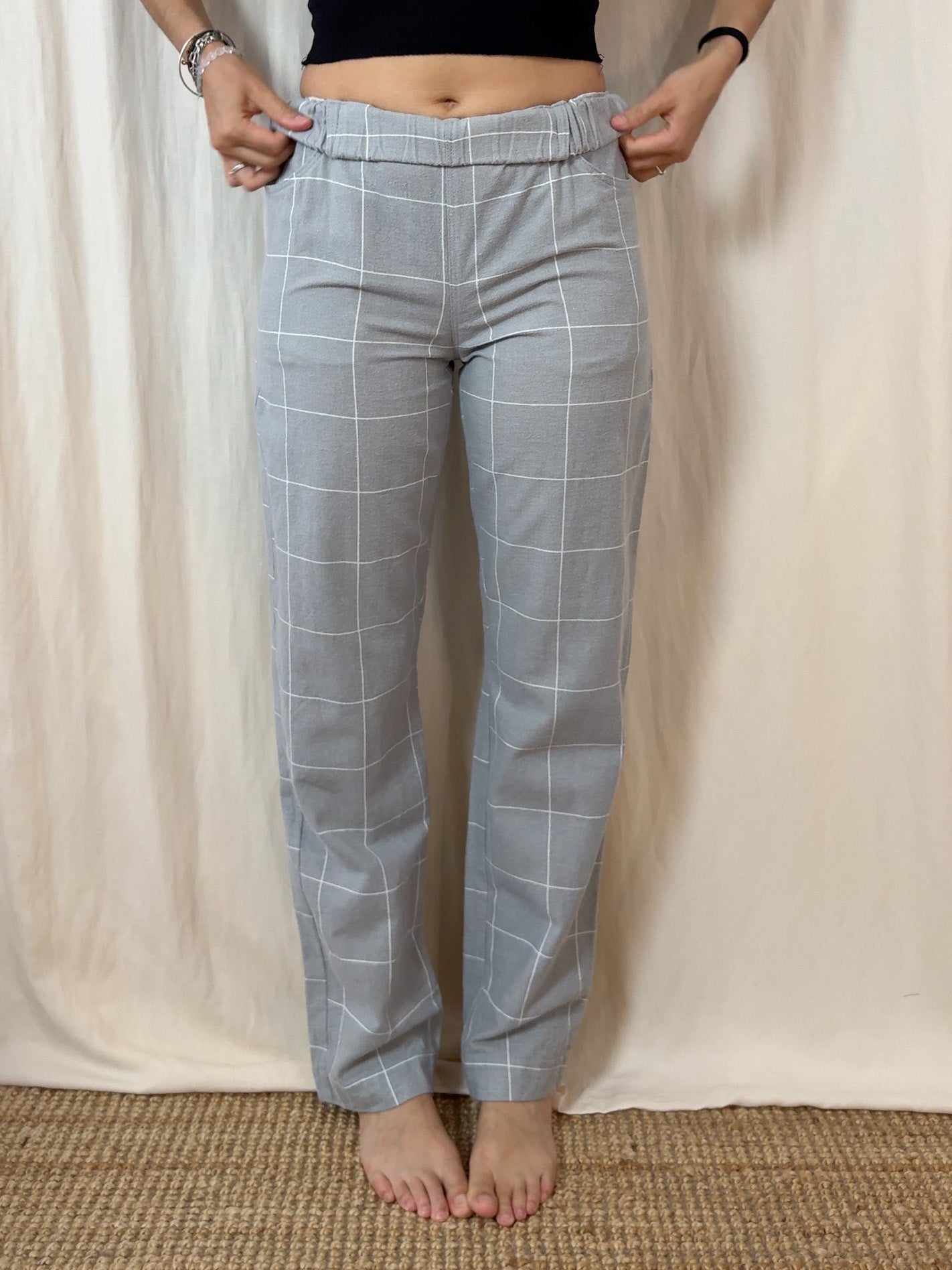 Straight trousers in light grey checks flannel