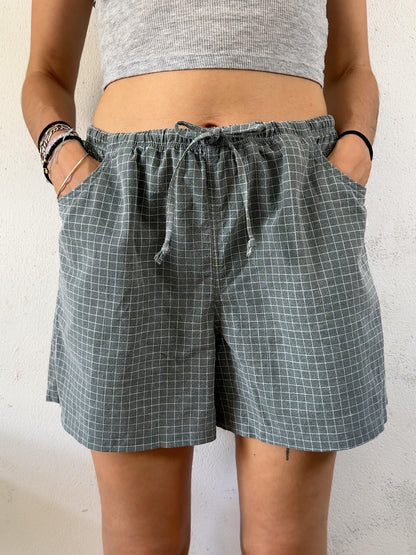 Drawstring shorts in grey checks mid length
