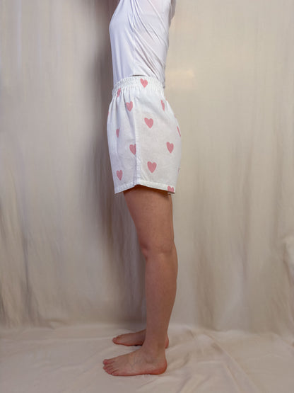 Shorts in white cotton with pink hearts