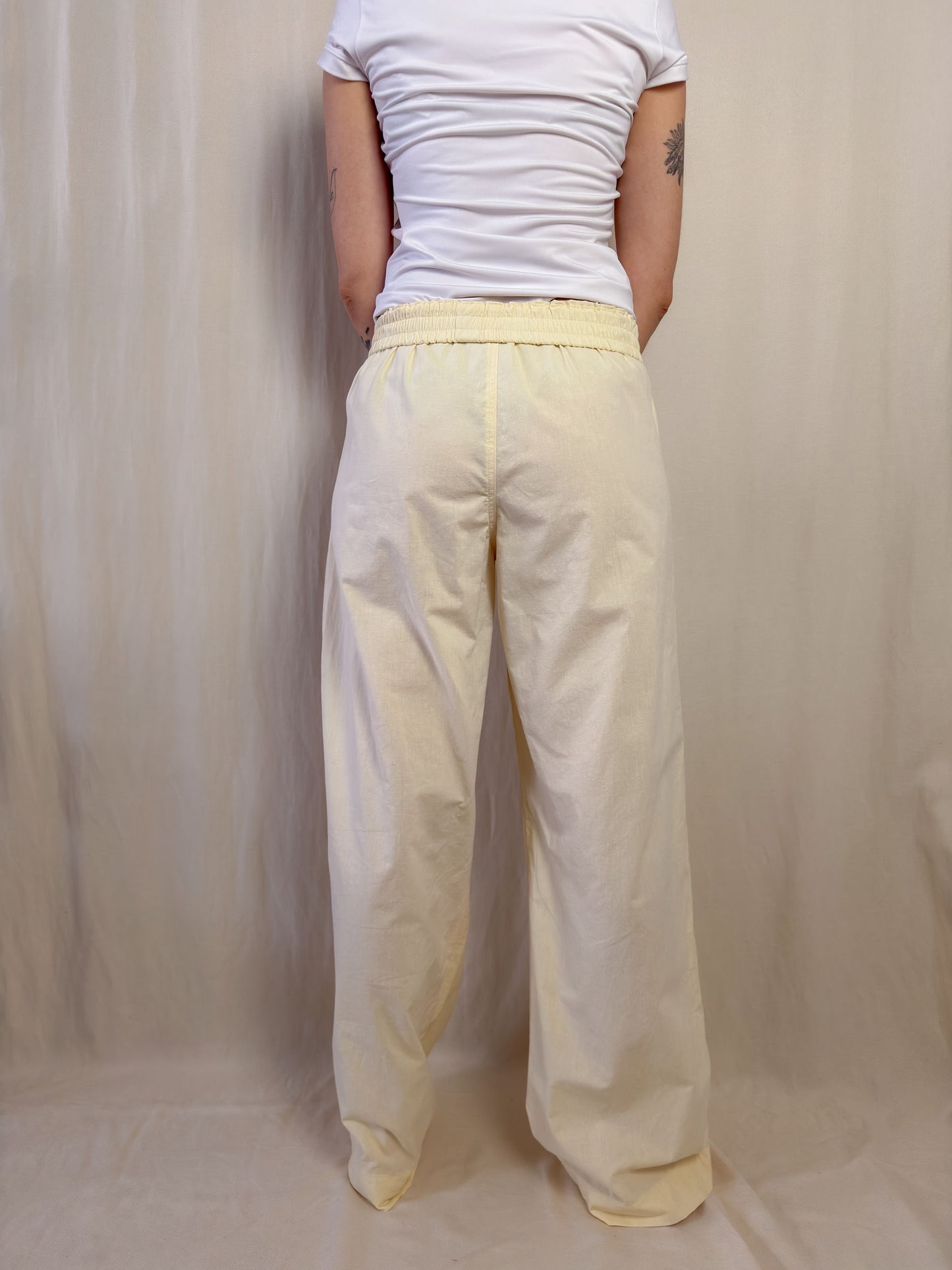 Wide leg trousers in pale yellow