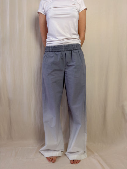 Wide leg trousers in gradient grey to white