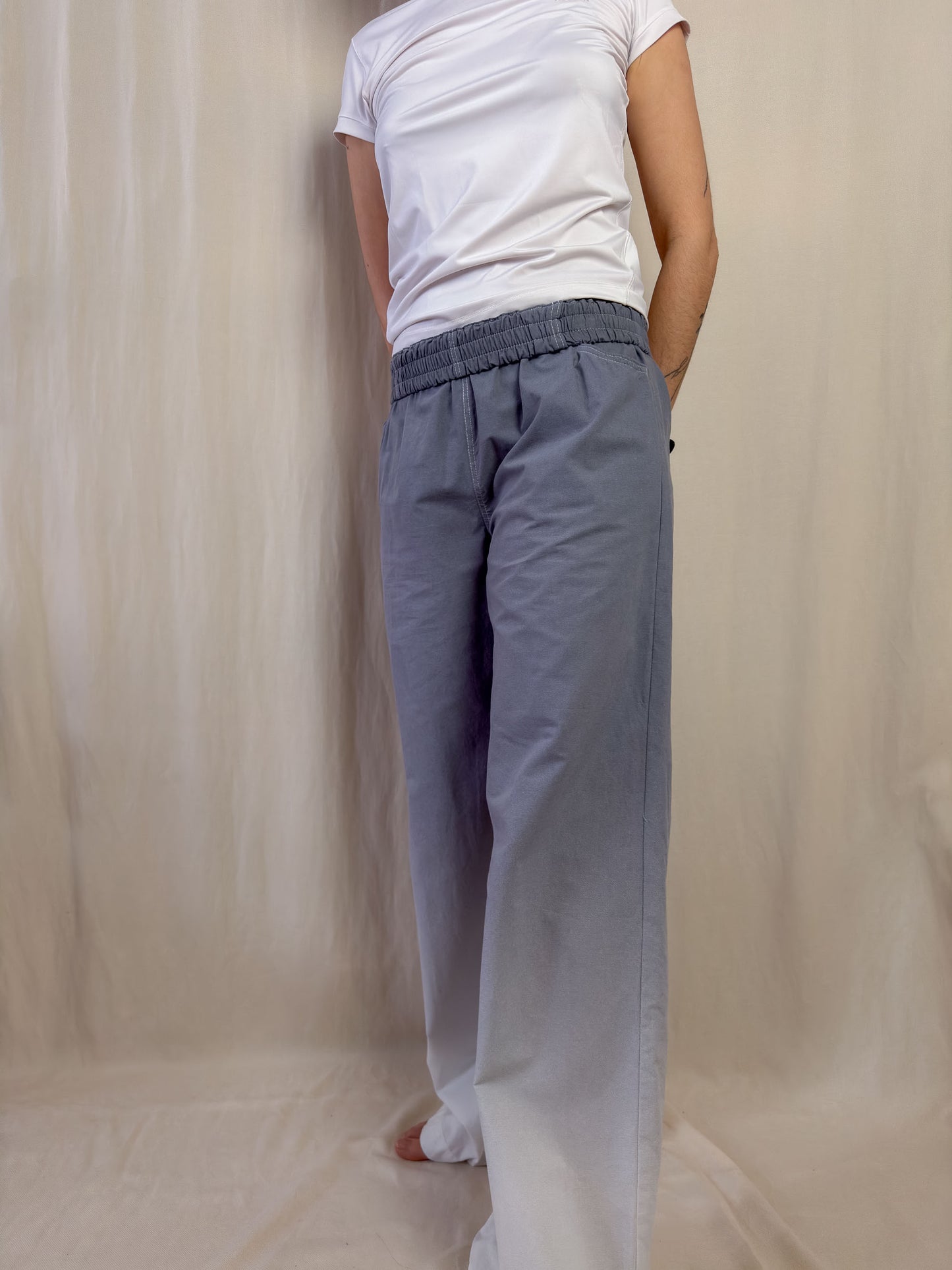 Wide leg trousers in gradient grey to white
