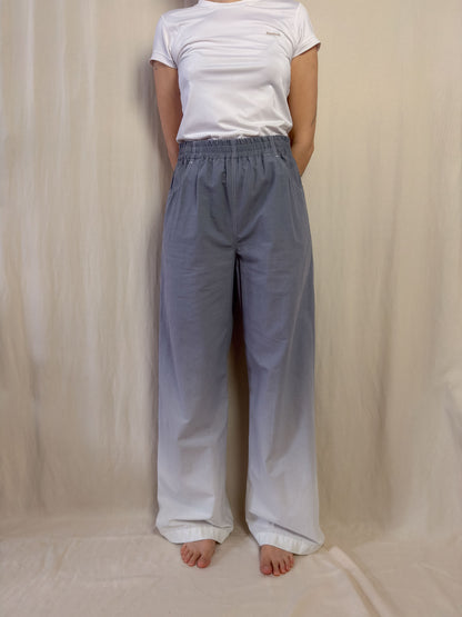 Wide leg trousers in gradient grey to white