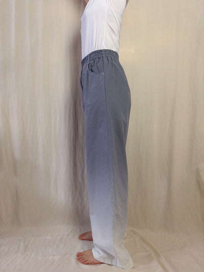 Wide leg trousers in gradient grey to white