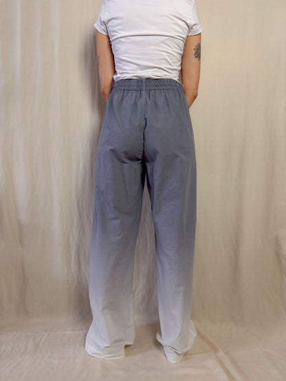 Wide leg trousers in gradient grey to white