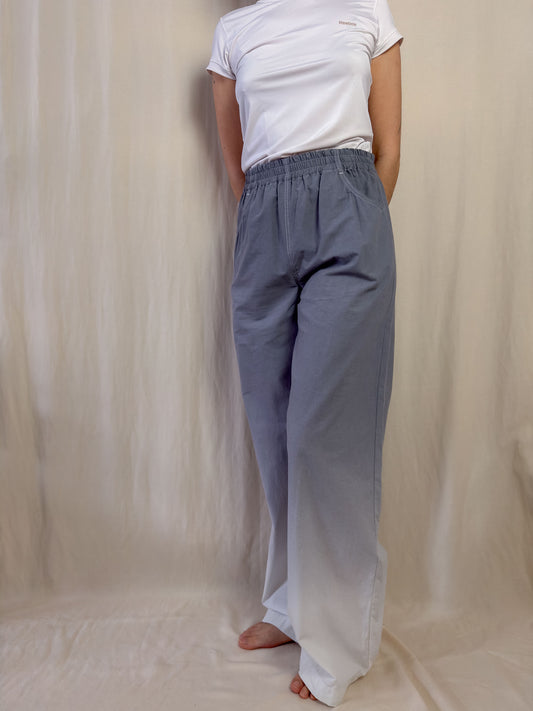 Wide leg trousers in gradient grey to white
