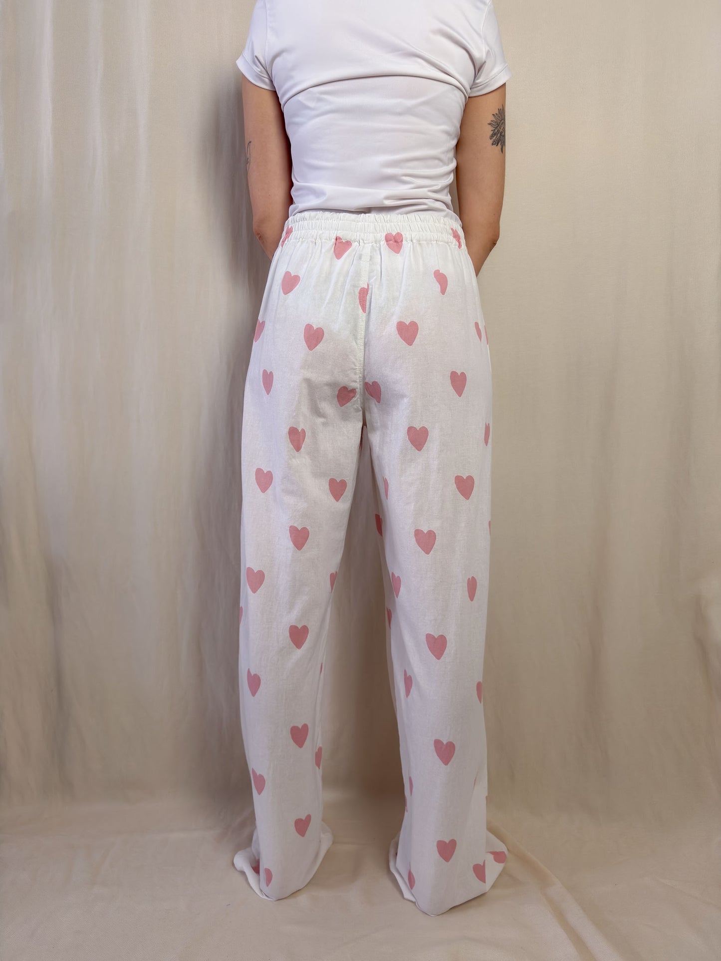 Wide leg trousers in white with pink hearts