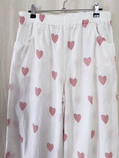 Wide leg trousers in white with pink hearts